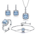 925 Silver Sky Blue Topaz Jewelry — Necklace, Earrings & Bracelet