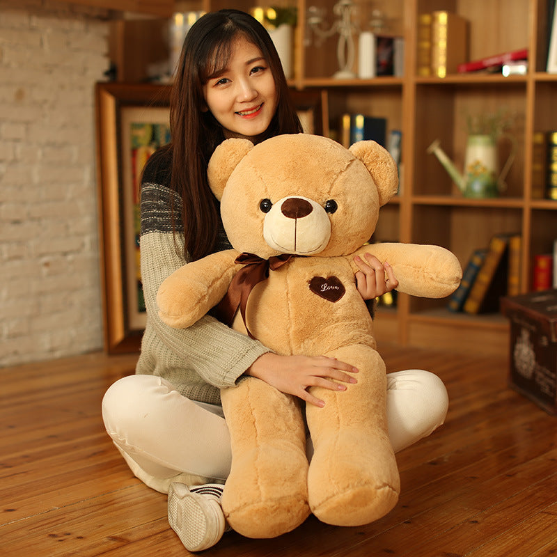 The Ribbon Hug Bear — Luxury Plush Teddy Collection