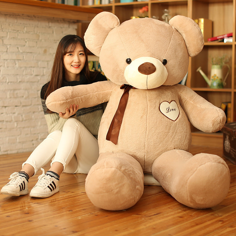 The Ribbon Hug Bear — Luxury Plush Teddy Collection