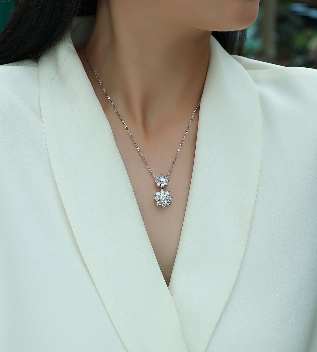 Moissanite Flower Pendant Necklace – Platinum-Plated Sterling Silver