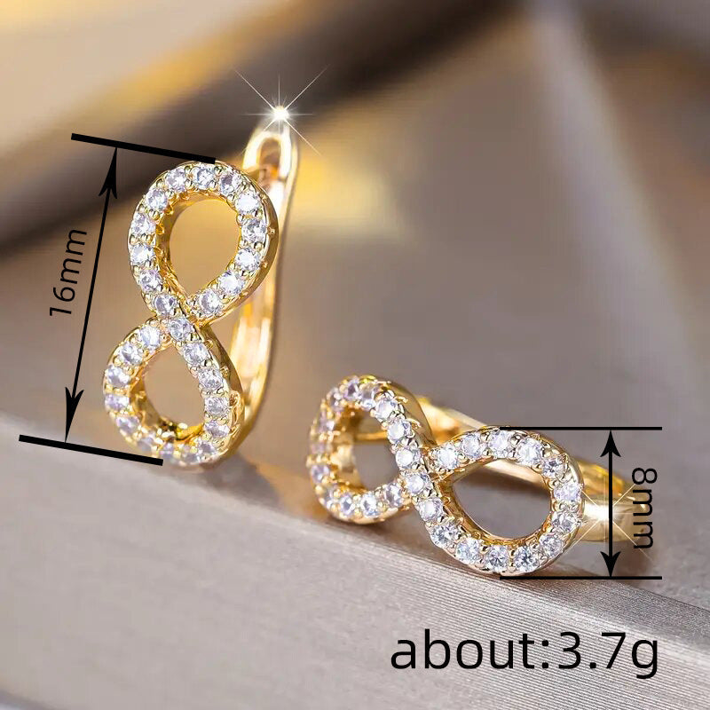 Infini — Gold Zircon Infinity Ear Clips